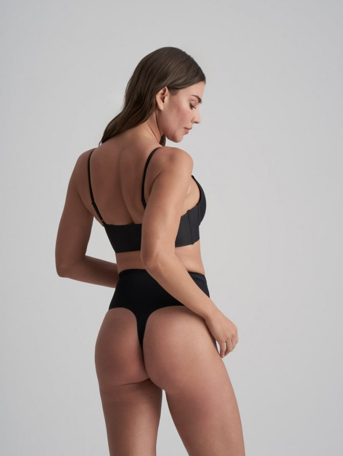 Lengvos kompresijos besiūlės formuojančios tanga kelnaitės INVISIBLE THONG BLACK